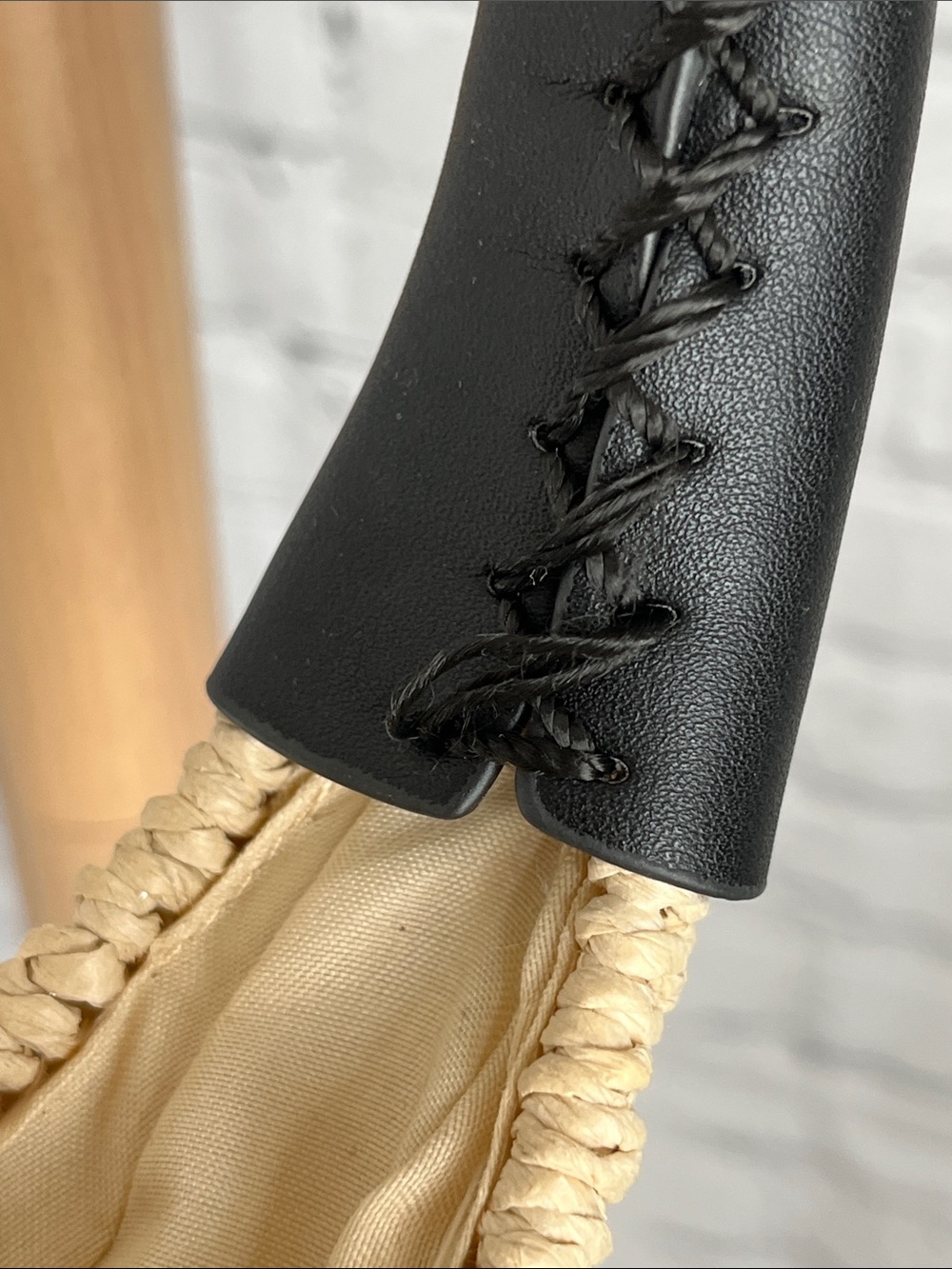 A New Day Round Woven Straw Bag with Black Handle - Picture 5 of 6